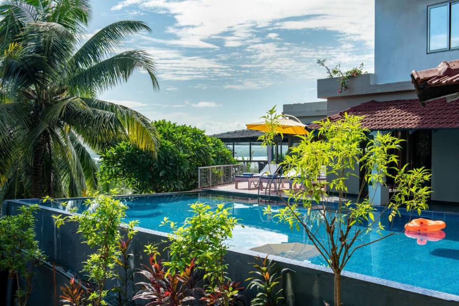 Stunning private pool villa in Goa with an infinity edge and tropical views.