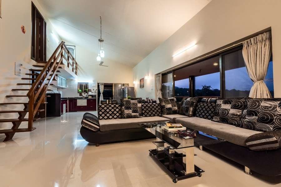 Stylish exterior of a Luxury Villa in Nashik with an intimate aquatic space.