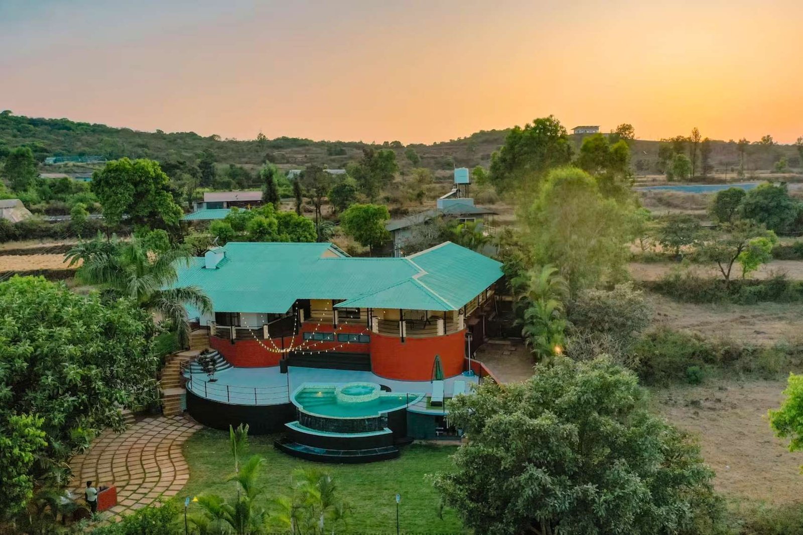 Sage & Stone – a luxury villa in Panchgani surrounded by mountains and greenery, offering a private pool, scenic views, and a peaceful retreat in nature.