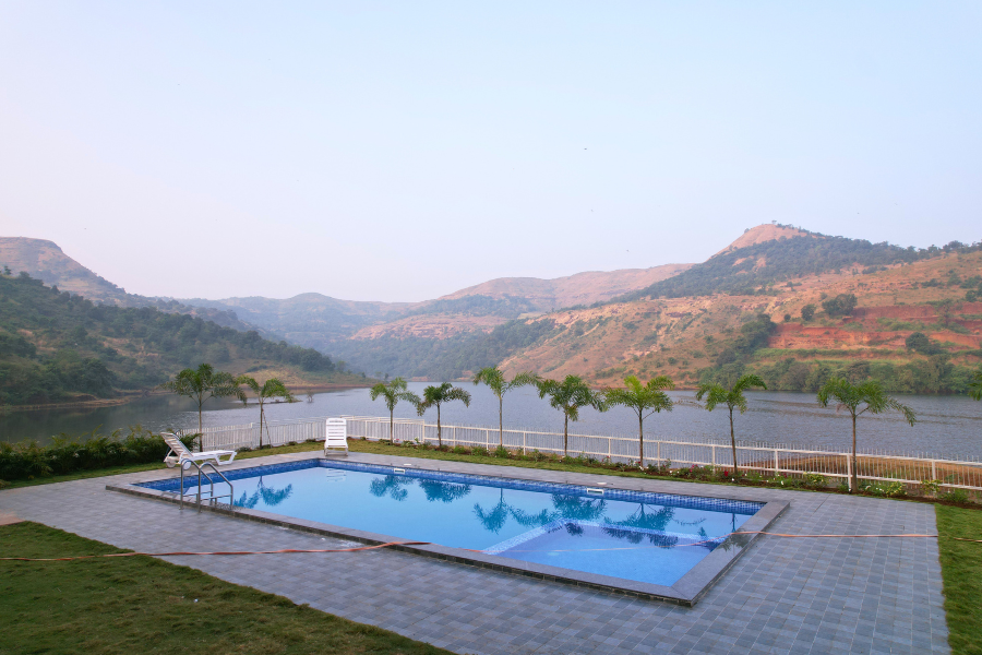 Eco-friendly villa with solar panels and organic garden promoting sustainable tourism.