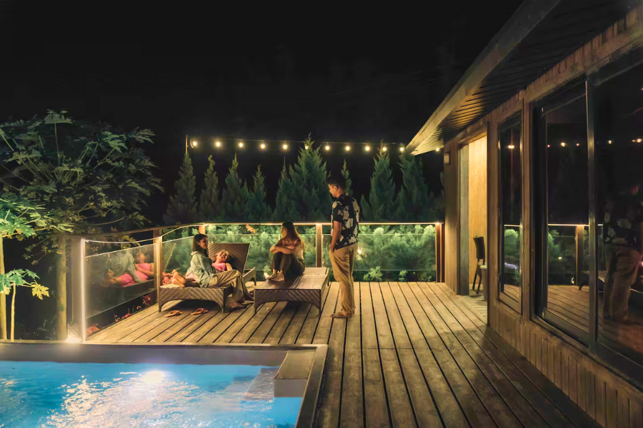 Family enjoying a cozy and spacious villa stay with homely comforts